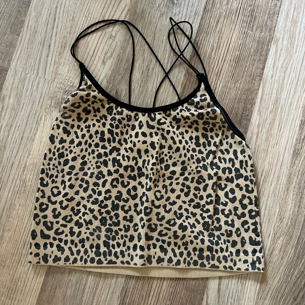 Spaghetti strap cheetah print crop cami.